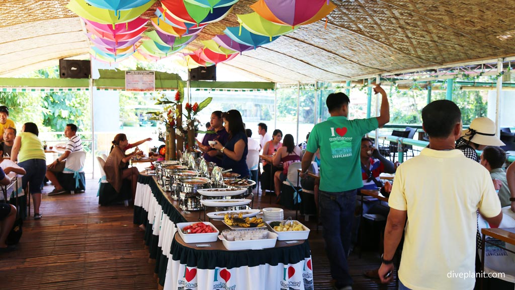 Buffet lunch on the barge at the Loboc River diving Bohol in the Philippines by Diveplanit