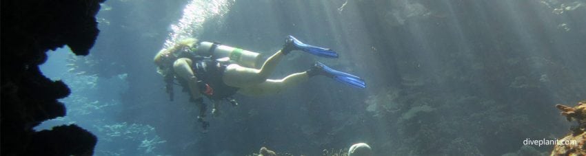 Mary Frances leaves the cave diving Mirror Pond at Russell Islands Solomon Islands by Diveplanit