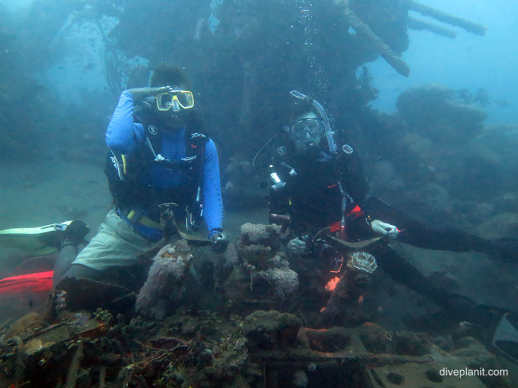 Deb and Captain Bronze at the controls at B17 Bomber diving Honiara in the Solomon Islands by Diveplanit