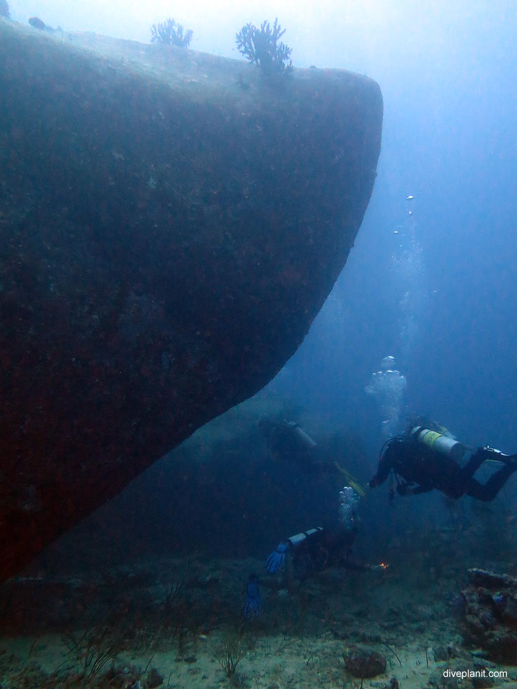 Large boulders tower of divers at Ko Bangu North Point diving with Sea Bees. Scuba holiday travel planning for Thailand - where, who and how