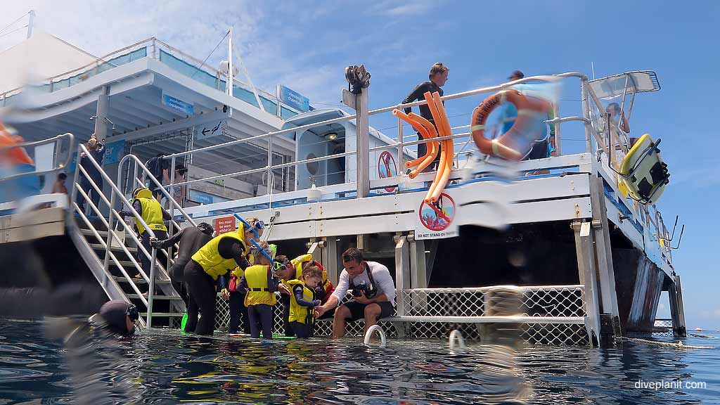 Kids going for a snorkel at Reefworld Pontoon Whitsundays