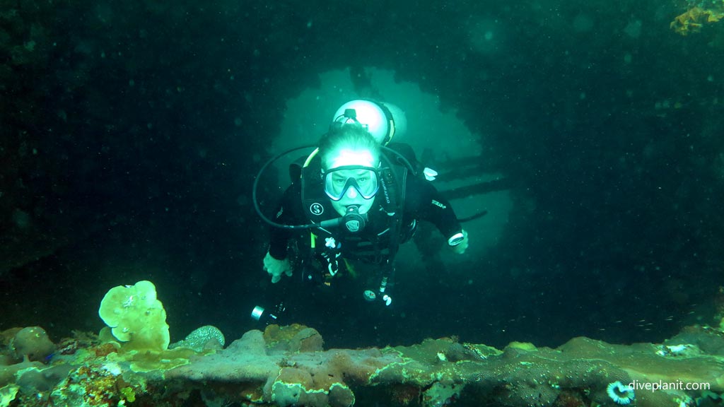 Simon in the funnel at Kyokuzan Maru diving Busuanga Palawan in the Philippines by Diveplanit