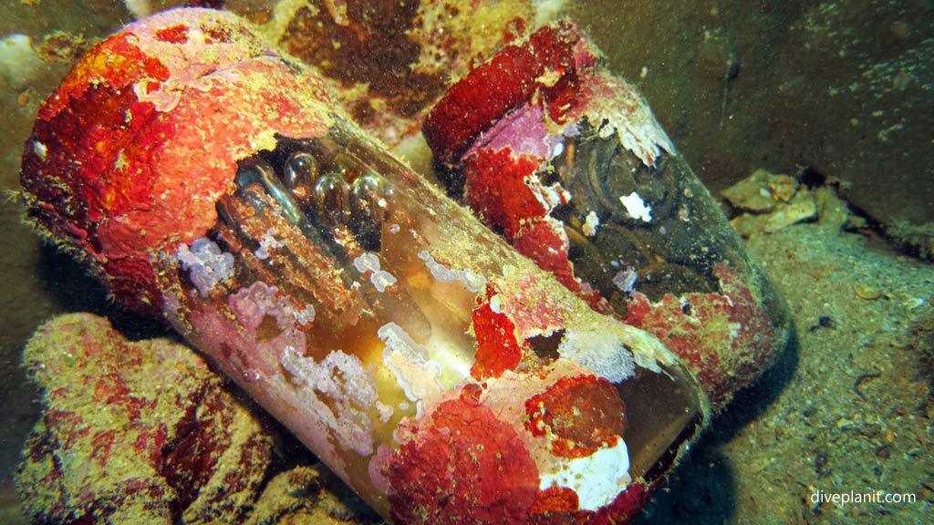 Jars of condoms and medicine vials at Toa Maru diving Gizo in the Solomon Islands by Diveplanit