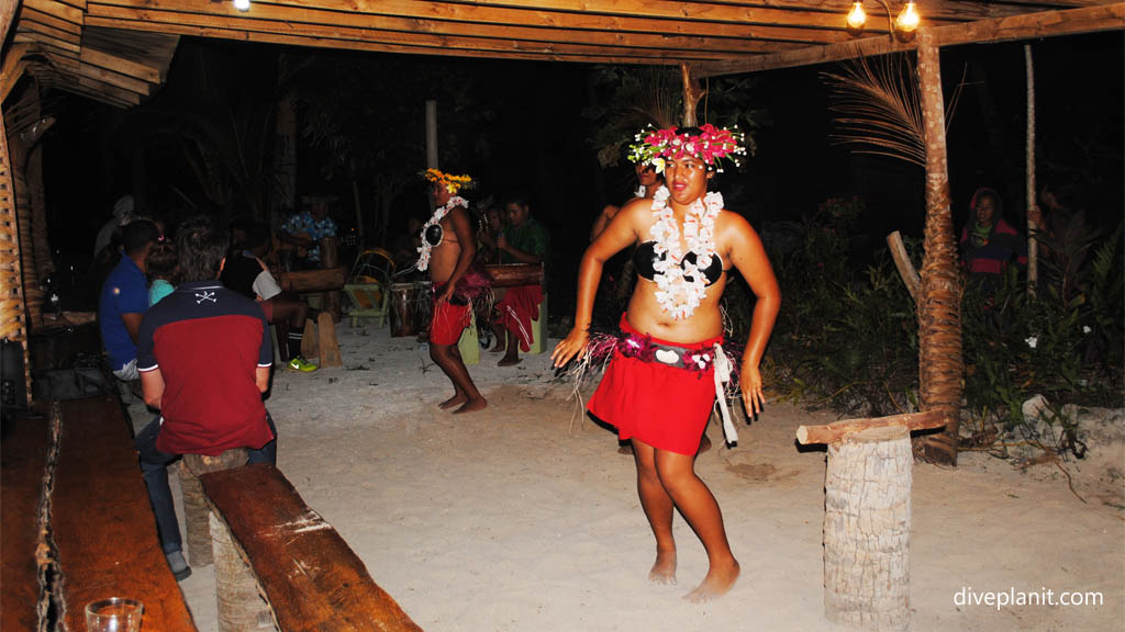 Dancing girl diving Aitutaki at Paradise Cove & Coconut Shack in the Cook Islands by Diveplanit