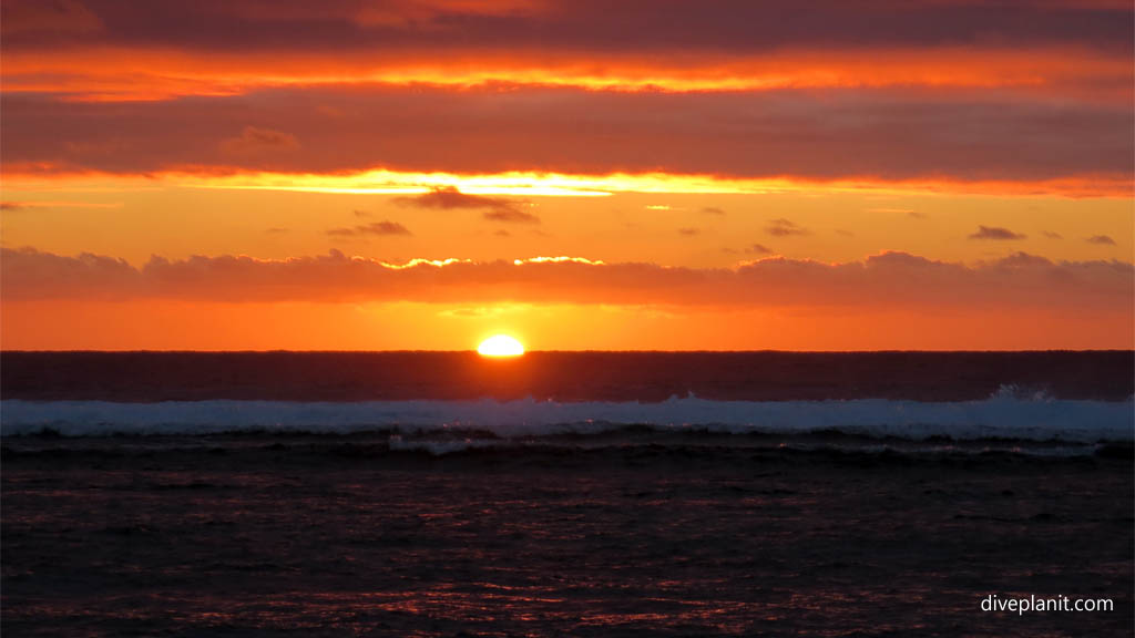 Sunset in the ocean diving Rarotonga at Sunset in the Cook Islands by Diveplanit