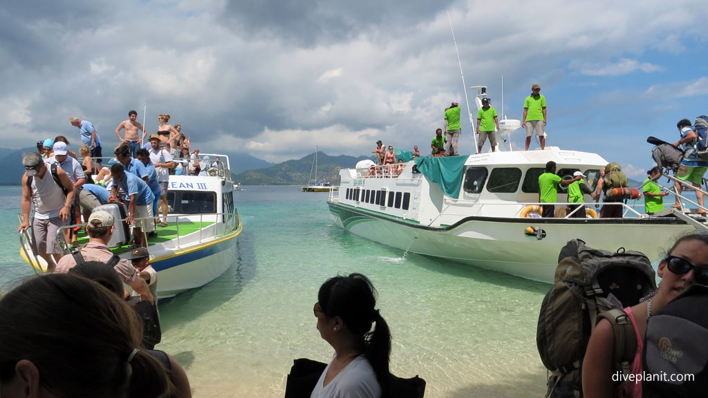 The organised chaos of arriving at the Gilis diving Gili Islands Lombok Indonesia by Diveplanit
