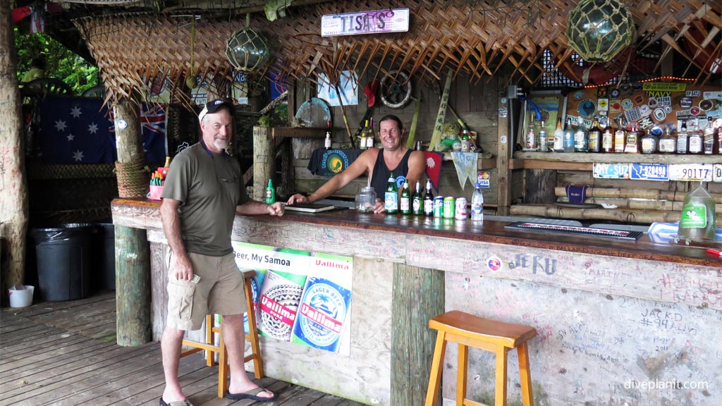 Friendly barman at the Tisas Bar and Grill in town American Samoa by Diveplanit