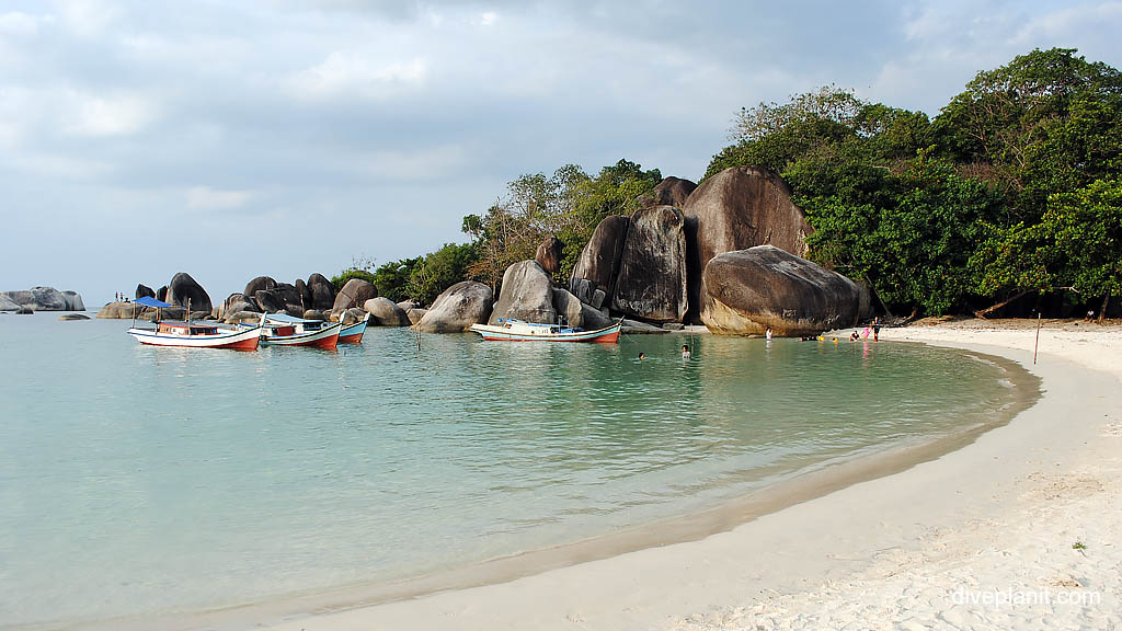 beach, boats and swimmers diving Belitung Island Bangka Belitung Islands Indonesia by Diveplanit