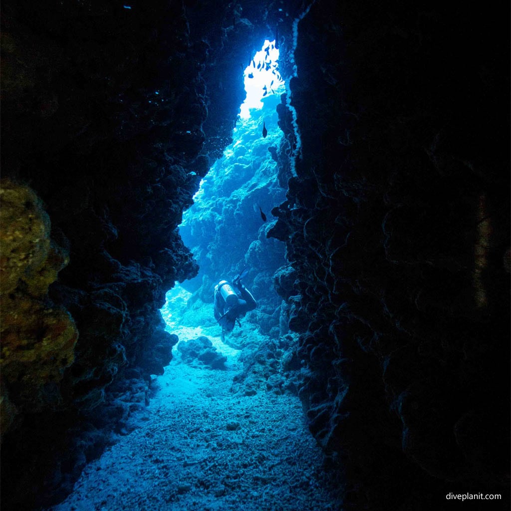 One of the many swim-throughs at Umanzaki diving Kerama Okinawa Japan Diveplanit 2036