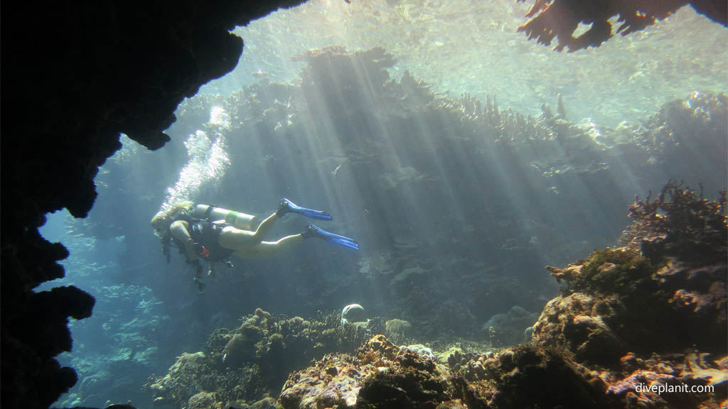 Mary Frances leaves the cave diving Mirror Pond at Russell Islands Solomon Islands by Diveplanit