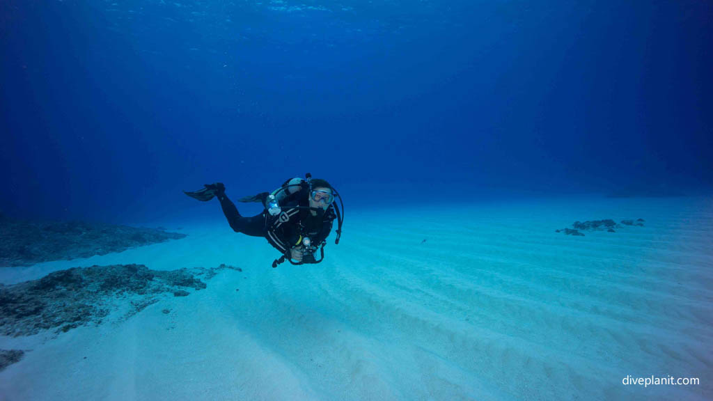 Diver over the sand at Yonaguni Diving Okinawa Japan by Diveplanit