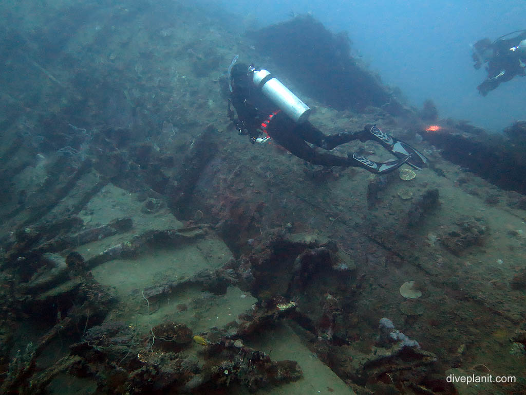 Size of the wreckage with diver at I-1 Submarine diving Honiara in the Solomon Islands by Diveplanit