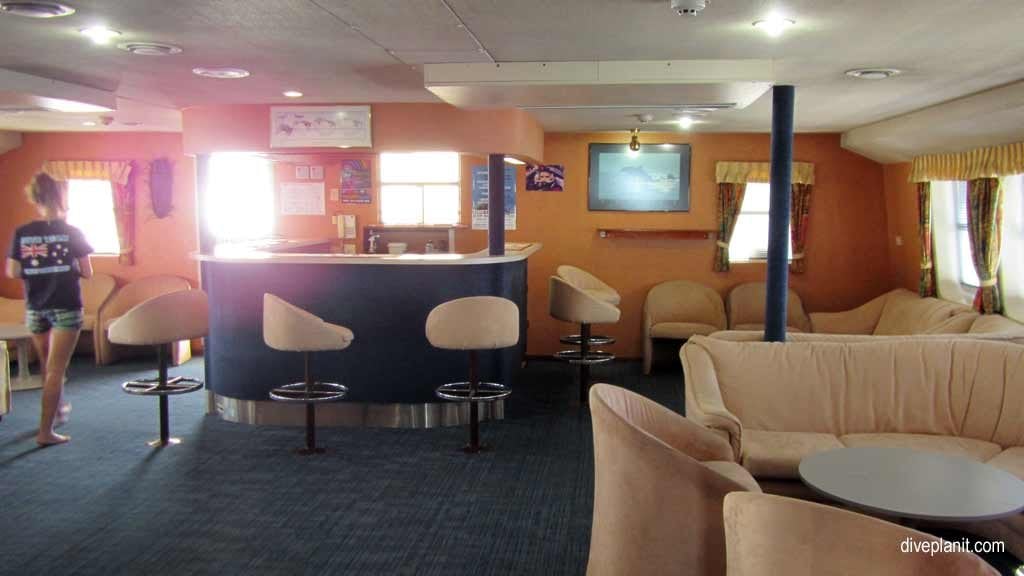 Lounge bar on the upper deck of ocean quest at the great barrier reef aboard the ocean quest diving the great barrier reef