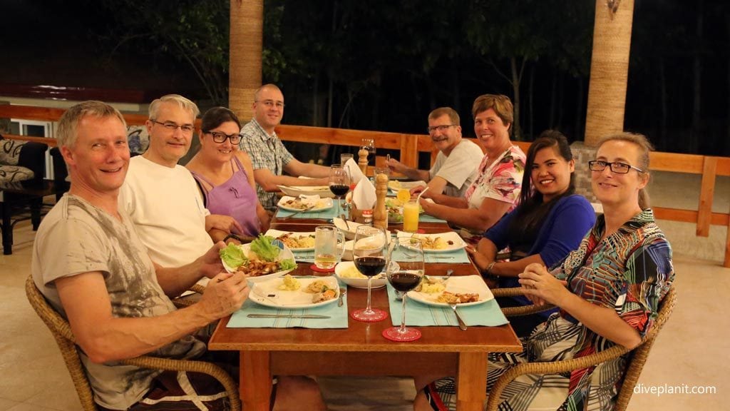 1467 Guests enjoy dinner on the long tables at Magic Oceans Resort diving Anda Bohol Philippines DPI 1467