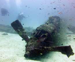 From the front with divers at airacobra wreck munda diving solomon islands feature