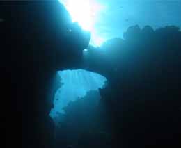 Lightshow at the reef edge with arch at two bommies diving vomo island fiji feature