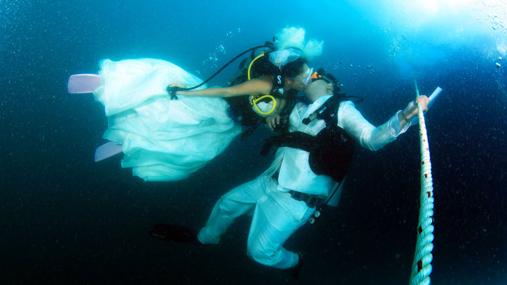 In Trang in Thailand, couples come from all over the country and often different countries to scuba dive to their underwater wedding beneath the waves