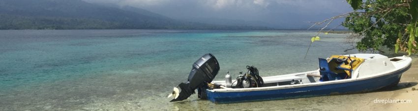 Dive munda smaller boat at lunch break island munda diving solomon islands