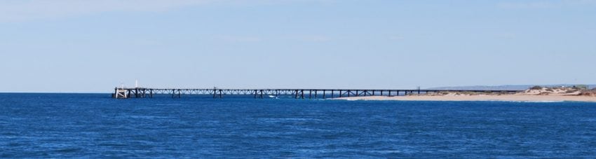 Exmouth navy pier above water supplied banner