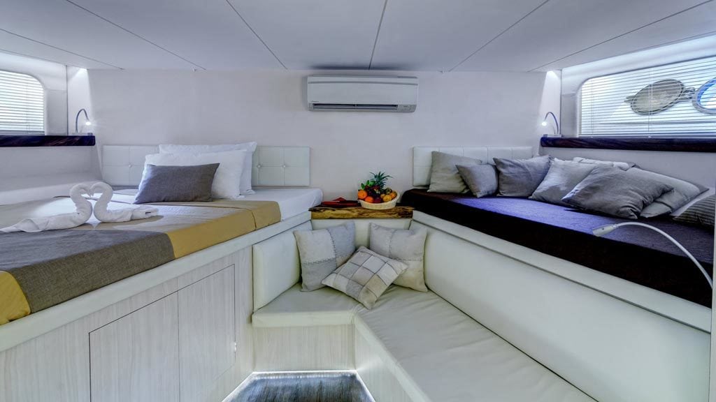 Pelagian liveaboard wakatobi sulawesi indonesia twin cabin day bed
