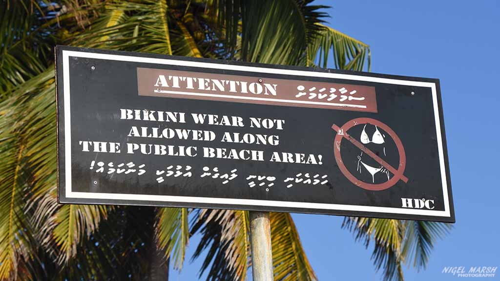 Maldives Diving: Dress code signage at Central Atolls Maldives by Diveplanit