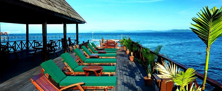 11-Borneo Divers Mabul Resort, Mabul Island, Sabah, Malaysia sunbathing-on-the-jetty