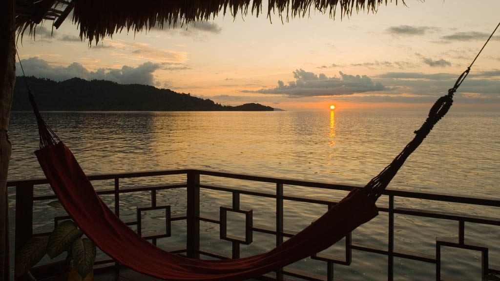 14-Gangga Divers at Papua Paradise Eco Resort Birie Island Raja Ampat hammock at sunset