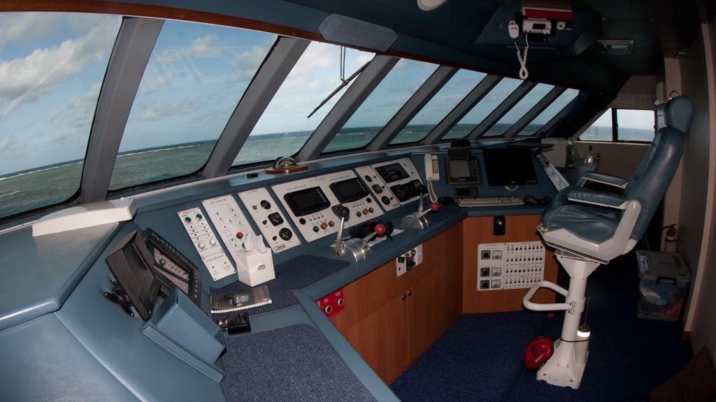 4 Mike Ball Dive Expeditions diving Coral Sea aboard Spoilsport Liveaboard Australia wheel-house