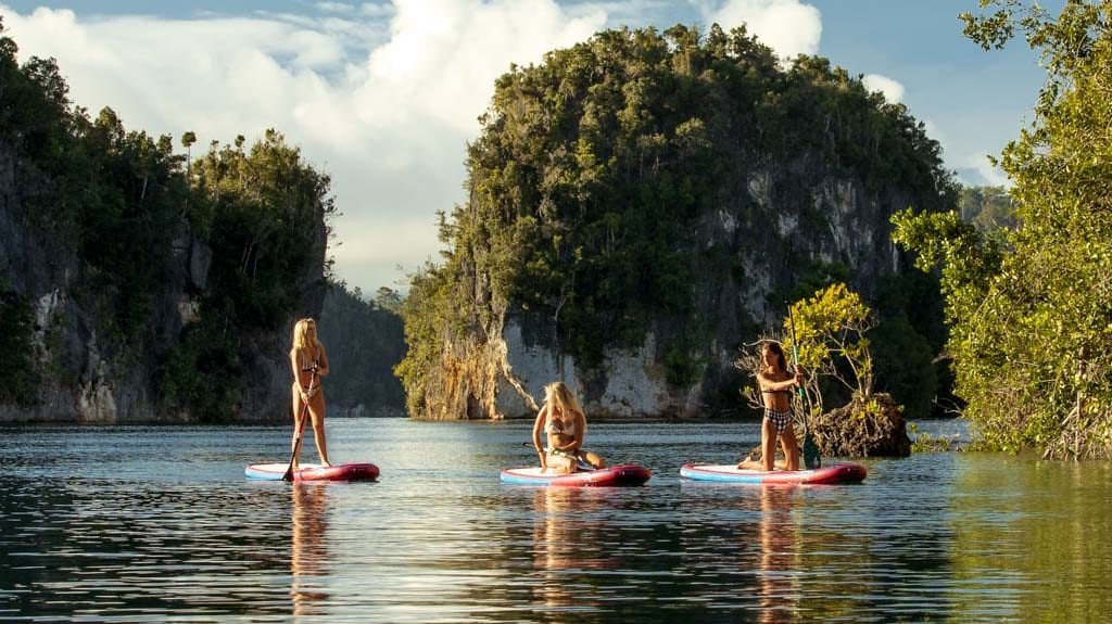 12 Meridian Adventure Dive Resort – Club Med style diving in Raja Ampat Indonesia girls-sup