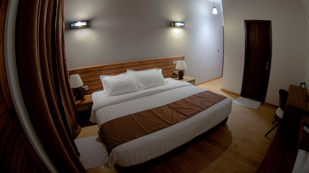 Rooms are spacious, sleeping up to three people, with LCD TV, with in-room kettle and fridge to store snacks