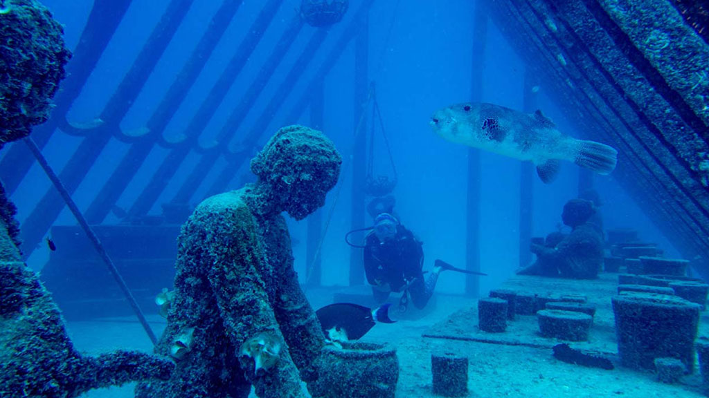 Diveplanit's Deborah Dickson-Smith becomes the first citizen scientist to participate in coral gardening diving the Museum of Underwater Art. 