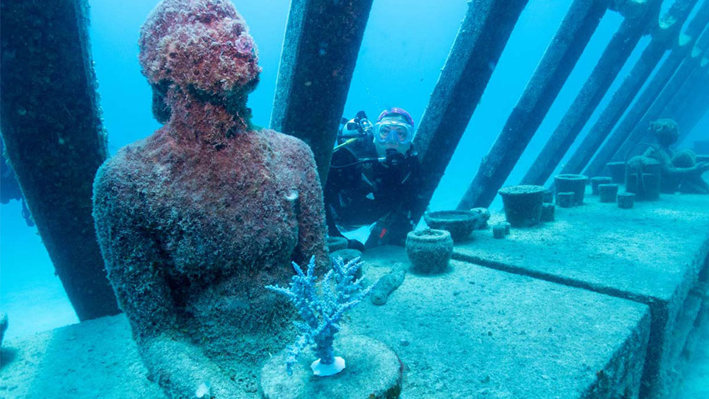 Diveplanit's Deborah Dickson-Smith becomes the first citizen scientist to participate in coral gardening diving the Museum of Underwater Art. 
