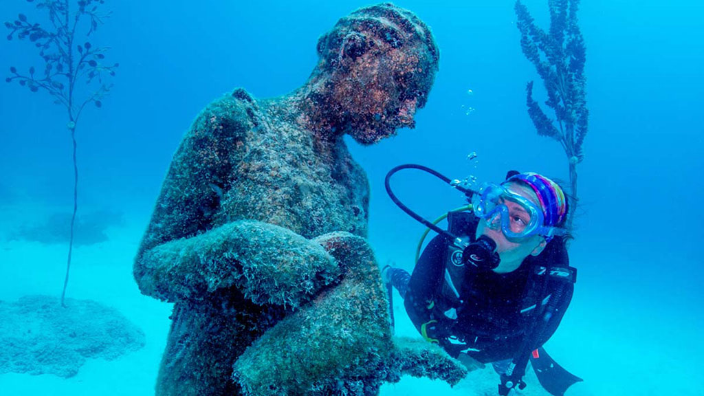 Diveplanit's Deborah Dickson-Smith becomes the first citizen scientist to participate in coral gardening diving the Museum of Underwater Art. 