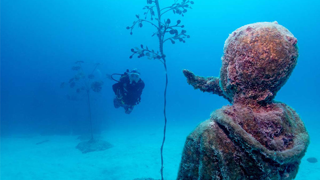 Diveplanit's Deborah Dickson-Smith becomes the first citizen scientist to participate in coral gardening diving the Museum of Underwater Art. 