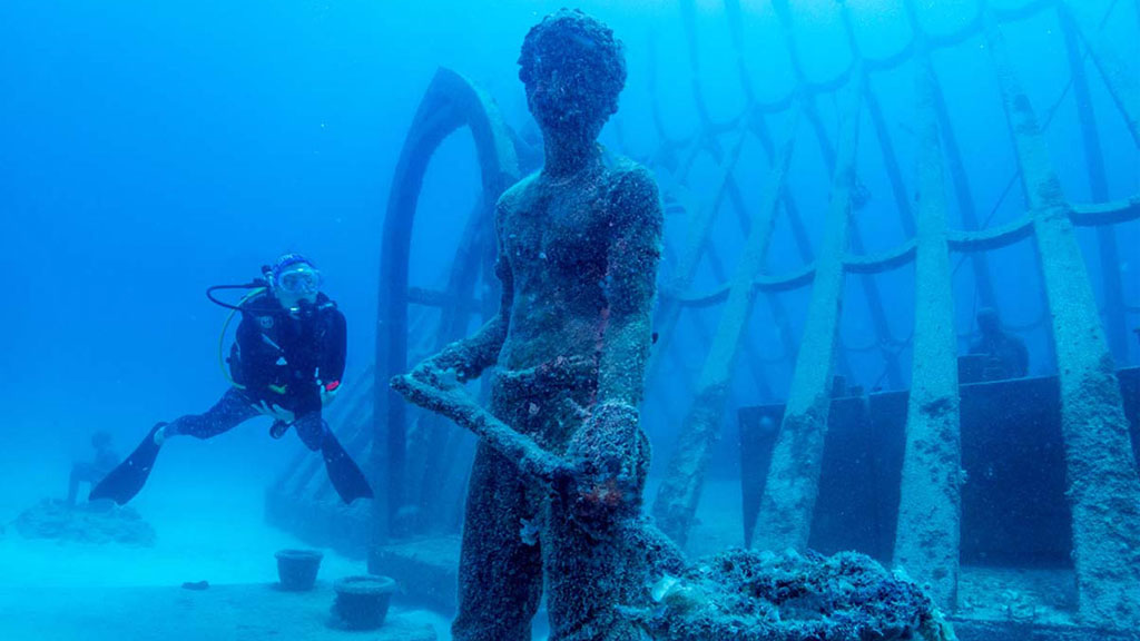 Diveplanit's Deborah Dickson-Smith becomes the first citizen scientist to participate in coral gardening diving the Museum of Underwater Art. 